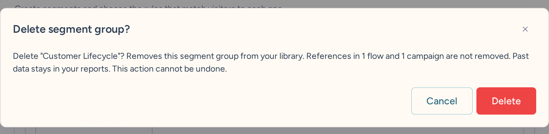 Delete segment group confirmation explaining that referencing flows and campaigns remain and historical data is kept